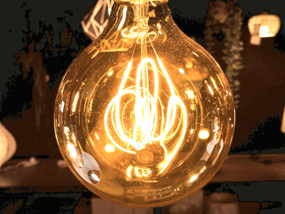 A light bulb is both a combination of matter and energy and a symbol of knowledge