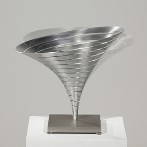 Martin Willing (b. 1958), Parabolkegel groß, 1991, Duraluminum, water jet cut, curved, prestressed, embedded in titanium plate, 11 3/8 (H) inches, 14 1/8 inches diameter. Courtesy of Hollis Taggart Galleries