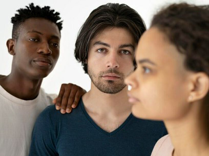 A multicultural group standing side by side, symbolizing diversity, stereotypes, and intercultural communication