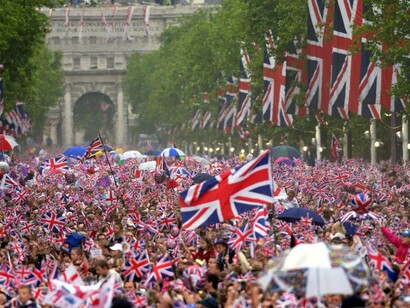 Crowds gather in The Mall, London, to celebrate Queen Elizabeth II’s Golden Jubilee in 2002