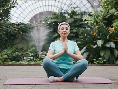 Woman meditating and practicing gratitude