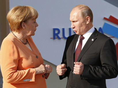 Angela Merkel and Vladimir Putin