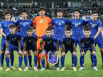 Players from Uzbekistan’s national team in action against Ukraine in 2011