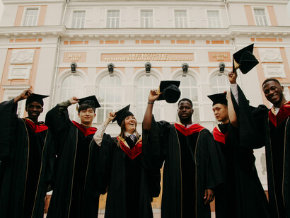Recent graduates celebrate the moment when university life ends, and a new step of their journey begins