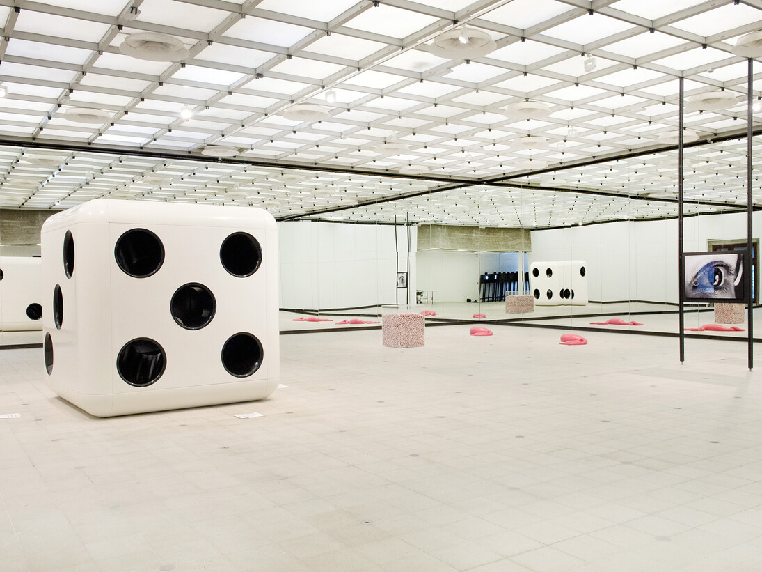 Carsten Höller, Dice (White Body, Black Dots), 2014; Half Mirror Room, 2008-2015, and Snake, 2014 © Carsten Höller. Installation view Carsten Höller- Decision, Hayward Gallery, London, 2015. Courtesy the artist. Photo © Linda Nylind