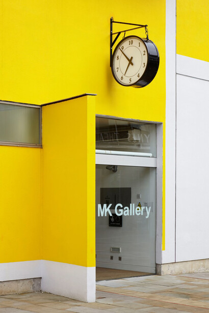 Installation view of Ruth Ewan’s We Could Have Been Anything That We Wanted to Be, 2011, Decimal clock 100 cm diameter x 30 cm