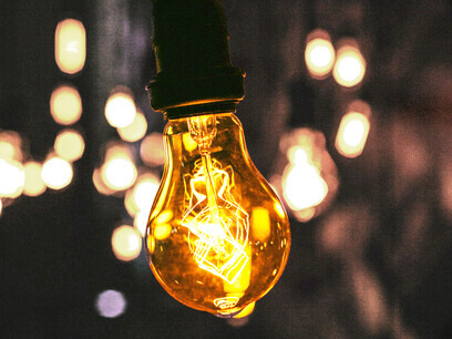 A light bulb represents the true nature of knowledge as a relationship between matter and energy