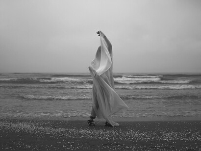 A fleeting silhouette, wrapped in mystery and sunlight