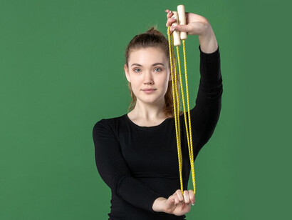 A student-athlete balancing a workout with academic responsibilities showcases the time management skills needed to excel in both sports and studies