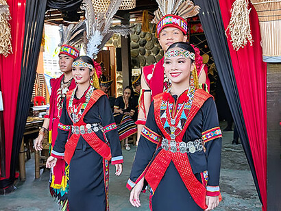 Murut Nabai youngsters in Linambungan Linangkit Karing ethnic dress performing The Mansayau dance during the Kaamatan Harvest Festival Sabah State, Malaysia