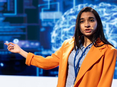 An IT technician showcasing the latest advancements in artificial intelligence, such as generative AI, AI chatbots, and machine learning