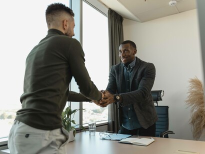 A handshake between the interview and the interviewee after a successful meeting
