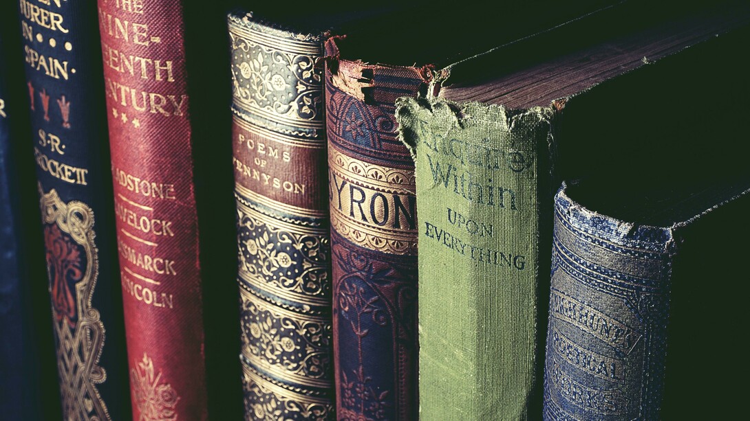 An intimate literary still life evoking HoleniaPoesia’s mission to recover forgotten voices, where aged books, manuscripts, and early twentieth-century journals turn poetry into memory, resistance, and rediscovery