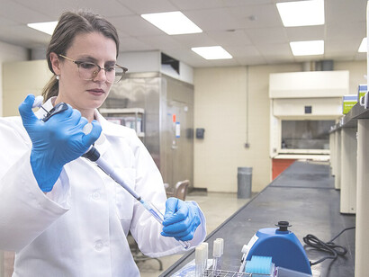 Jennifer Acuff, assistant professor of food microbiology and safety in the department of food science, investigates strategies to improve fresh and processed food safety and protect food products from microbial contamination, UA System Division of Agriculture photo by Fred Miller