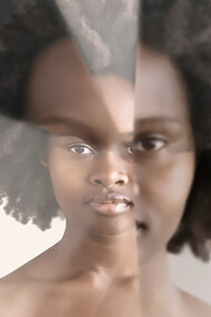 A black woman with prism kaleidoscope effect