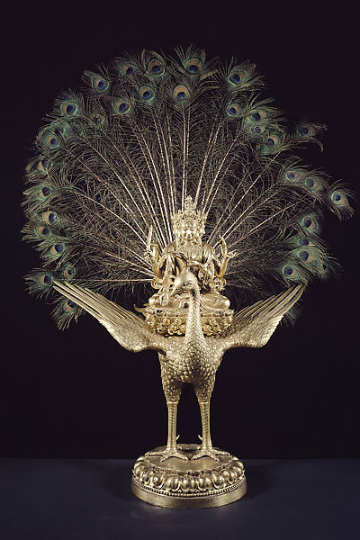 Mahamayuri on peacock, Ming dynasty (1368–1644), Xuande mark and period (1426–35). Courtesy of the Metropolitan Museum of Art