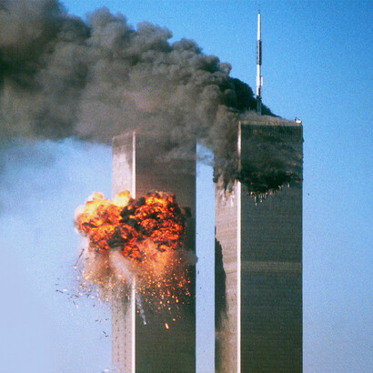 The twin towers burning