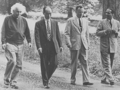 From left to right, physicists Albert Einstein, Hideki Yukawa, John Wheeler, and Homi Bhabha in conversation as they walk through Marquand Park in Princeton, New Jersey, USA (1954)