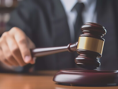 A legal person holding a gavel