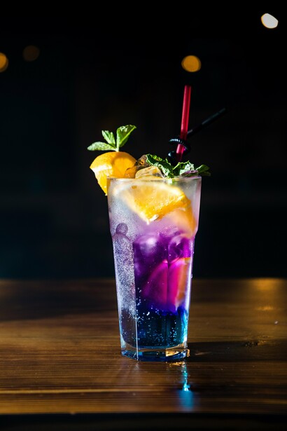 Mixed purple cocktail with oranges