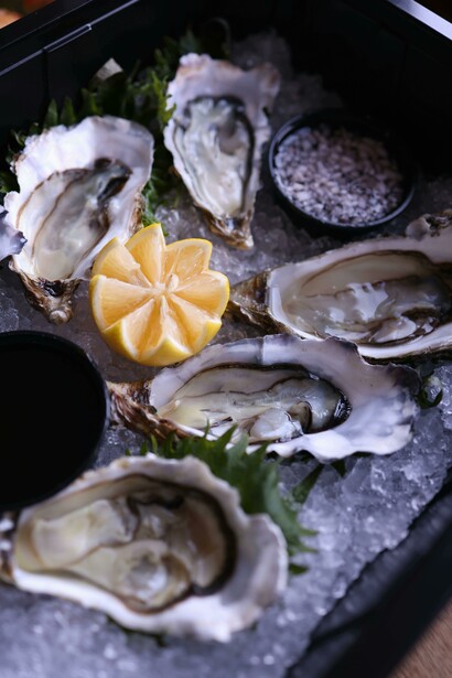 A refreshing platter of oysters displaying coastal cuisine that reflects traditions from the Lowcountry to Mediterranean