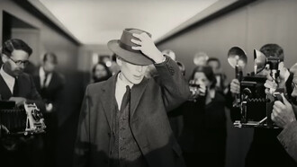 Cillian Murphy, in Oppenheimer movie as J. Robert Oppenheimer evading paparazzi