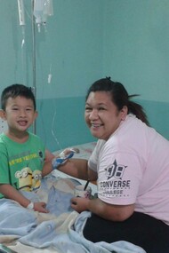 Igi Takasan and his mother during treatment, her fight for medical cannabis access began with this battle for leukemia 