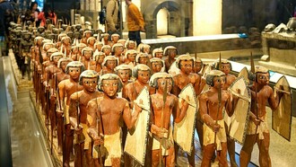 Wooden model soldiers from the tomb of Mesehti in Asyut, displayed at the Grand Egyptian Museum in Egypt