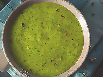 Culinary experience with a vibrant and raw organic green Chimichurri sauce