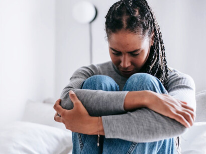 As the world whirls around her in a frenetic dance of ceaseless motion, she stands frozen in the desolate landscape of her own stagnant mind