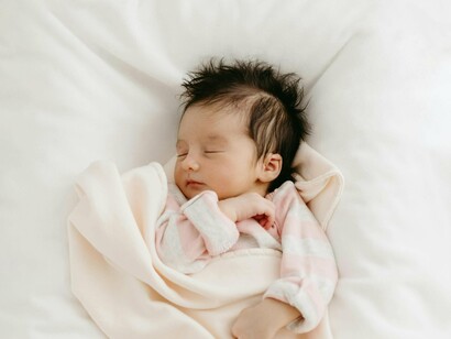 Un bambino che dorme... tenero come una coscina di pollo!