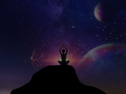 Seated beneath the vibrant hues of the sky, a woman reflects the interconnected tapestry of existence