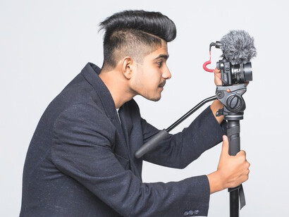 With a camera in hand, the filmmaker captures the essence of storytelling, highlighting how passion and skill can drive Pakistani cinema forward despite systemic barriers
