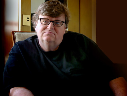 Michael Moore is an American documentary filmmaker, author, and activist known for his critical and often controversial examinations of social, political, and economic issues, particularly through films like Fahrenheit 9/11 and Capitalism: A Love Story