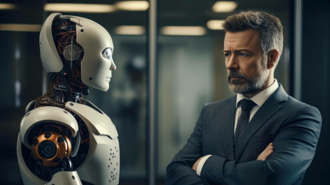 Robot di fronte a un essere umano: "Per millenni, la conversazione è stata un’esperienza umana: situata, incarnata, relazionale. Oggi, ci troviamo di fronte a interlocutori non umani — algoritmi capaci di generare risposte plausibili, spesso sorprendenti, ma privi di corpo, di emozione, di vissuto"