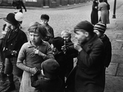 Humphrey Spender, Parliamentary by-election – Children hanging around outside, 1937/38, © Bolton Council, from the Collection of Bolton Library and Museum Services, Courtesy of the Humphrey Spender Archive