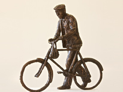 Man Pushing a Bicycle