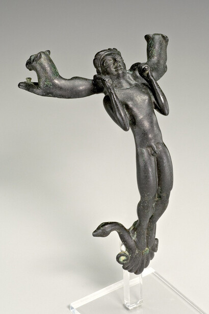 Greek, probably made in Samos, Ionia
Handle in the Form of a Youth
Archaic period, ca. 540 BC
Bronze, solid cast
H. 6 1/8 in. (15.5 cm)
Sidney and Lois Eskenazi Museum of Art, Gift of the Honorable Burton Y. Berry in recognition of Chancellor Herman B Wells’s services to the University