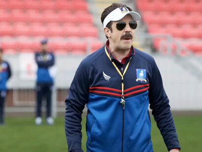 Ted Lasso is a heartwarming series that explores the transformative power of kindness and optimism through the journey of an American football coach leading a British soccer team