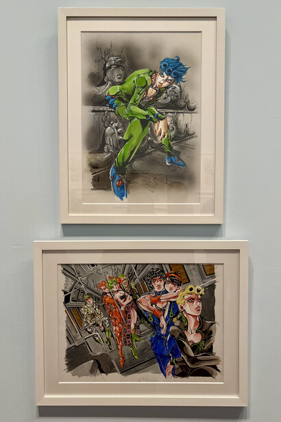 Photo of two colored artworks by Hirohiko Araki, creator of JoJo’s Bizarre Adventure, from the exhibition “Art Of Manga” at the de Young Museum in San Francisco. The top frame features Giorno Giovanna, protagonist of Part 5 Vento Aureo (Golden Wind). The bottom frame shows Giorno alongside other members of Team Bucciarati, including Bruno Bucciarati, Guido Mista, Narancia Ghirga, Pannacotta Fugo, Leone Abbacchio, and Trish Una. Photo: © İdil Burkutoğlu