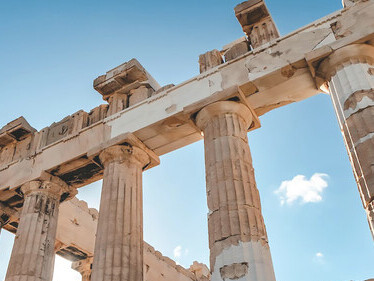 Gracefully crowning the Athenian Acropolis in Greece, the Parthenon, a former temple, epitomizes the splendor of ancient Greek architecture