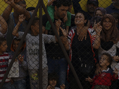 Women and children among Syrian refugees protest at the platform of Budapest Keleti railway station amidst the refugee crisis. Budapest, Hungary, Central Europe, September 4, 2015
