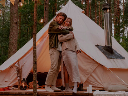Under the soft glow of the evening light, the man and woman dance together, celebrating the deep connections that shape their lives and guide their personal growth