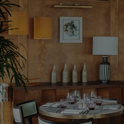 The interior of Brighton Beach House in Brighton and Hove, England, exudes an effortless blend of coastal charm and contemporary elegance, creating a welcoming and relaxed atmosphere for guests