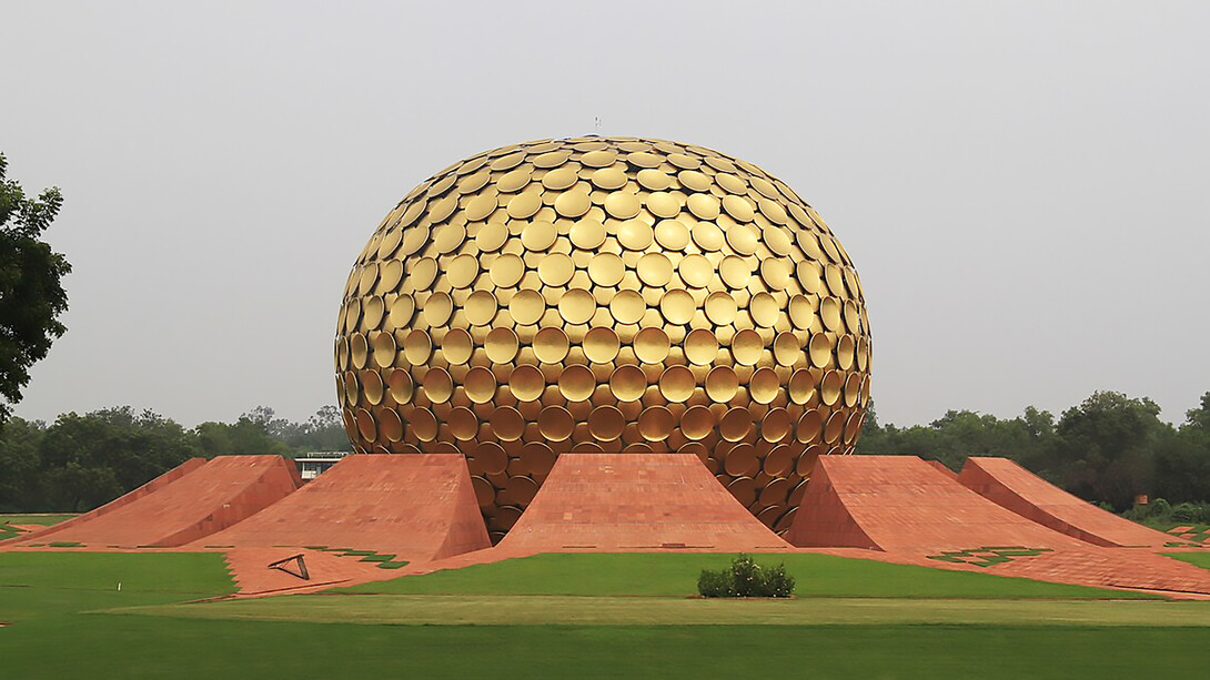 Auroville is an "experimental" city, an "intentional community" based on the vision of Sri Aurobindo (Matrimandir, Auroville, Pondicherry, India)
