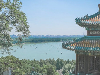 Multicolored temple with a lake view showcasing various architectural designs from ancient China, Beijing