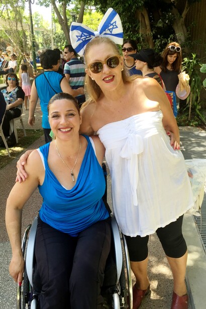 Maytal Wax (left) and Sarah Zelcerman (right). Maytal was seriously wounded in a Tel Aviv terrorist attack. Sara has been taking care of wounded soldiers and terror victims for 34 years. Today Maytal is a competitive wheelchair dancer and is raising her two twins daughter. Photo by Carrie Hart