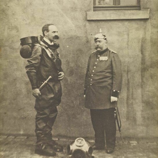 Unknown, Dr John Scott Haldane, 1860 – 1936. Physiologist. Wearing a diving suit in the company of a German soldier, about 1906, Silver gelatine print: 18.50 x 16.50 cm, Scottish National Portrait Gallery