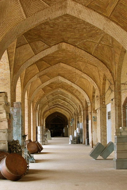 The Grand Bazaar of Kerman, among the largest and most historic bazaars in Iran, extends for more than one kilometre through the heart of the old city, alive with the colours, sounds, and scents of local life