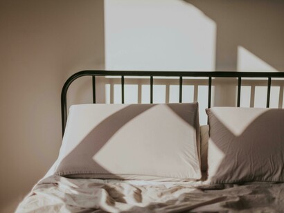An empty bed showing that silence after separation can be deafening but also clarifying 